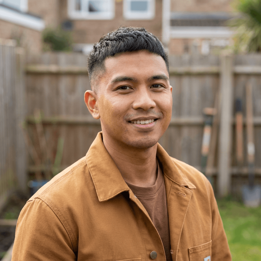 Dale R., a male homeowner in his mid 50s, smiling with arms crossed